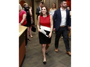 U.S. Rep. Martha McSally, R-Ariz., arrives to deliver her signatures to the Arizona Secretary of State's office Tuesday, May 29, 2018, at the Capitol in Phoenix. McSally is officially running as a Republican for U.S. Senate seat being vacated by retiring Republican Sen. Jeff Flake. Women running for office have crossed another threshold with a record number of candidates for the U.S. Senate. In the two major parties, 42 women are expected to have qualified for 19 Senate seats.