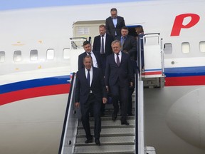 Russian Foreign Minister Sergei Lavrov, front, and his delegation arrive at the Pyongyang Airport, Thursday, May 31, 2018, in Pyongyang, North Korea. Lavrov's visit comes ahead of a planned summit between President Donald Trump and North Korean leader Kim Jong Un and is seen as an attempt by Moscow to ensure its voice is heard in the North's diplomatic overtures with Washington, Seoul and Beijing.