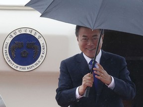 FILE - In this Wednesday, May 9, 2018, file photo, South Korean President Moon Jae-in arrives at Tokyo International Airport in Tokyo. For a few months, everything seemed to be clicking into place for South Korean President Moon Jae-in as he meticulously set up crucial nuclear negotiations between Washington and Pyongyang following a year of intense animosity. But he now heads into a White House meeting with President Donald Trump with uncertainty over his status in the diplomatic driver's seat.