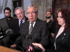 In this framegrab from video, Bloc Quebecois MP Louis Plamondon announces he is quitting the party caucus in Ottawa, Wednesday, Feb.28, 2018.