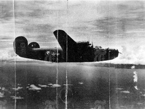 A photo provided by the U.S. Army Air Force of the B-24 bomber called Heaven Can Wait, to which Second Lt. Thomas V. Kelly Jr. was assigned, taken in 1943, the year before it was shot down off Papua New Guinea. The discovery of the bomber shot down 74 years ago in Hansa Bay has helped Kelly's family find closure, and shows how new technologies are locating those who were long lost.