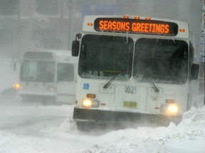 A couple of Metro Transit buses get stuck near the corner of Spring Garden and Barrington Streets. Metro Transit later pulled its buses from the road due to bad road conditions. A decision released Tuesday said management at the Halifax Transit maintenance yard allowed a bully who made racist statements to run rampant in the workplace.
