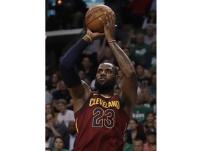 Cleveland Cavaliers forward LeBron James shoots against the Boston Celtics during the first half in Game 2 of the NBA basketball Eastern Conference finals Tuesday, May 15, 2018, in Boston.