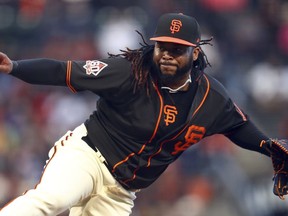 San Francisco Giants pitcher Johnny Cueto works against the Los Angeles Dodgers in the first inning of the second game of a baseball doubleheader Saturday, April 28, 2018, in San Francisco.