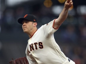 San Francisco Giants pitcher Ty Blach works against the Cincinnati Reds during the first inning of a baseball game Tuesday, May 15, 2018, in San Francisco.