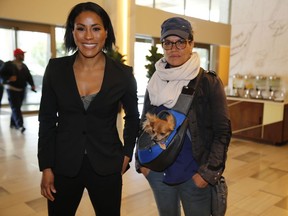 Norwegian female boxing star Cecilia Braekhus, left, arrives with her trainer, Lucia Rijker, at a news conference in Los Angeles Wednesday, May 2, 2018. Braekhus will fight against Kali Reis during the boxing event at StubHub Center in Carson, Calif., on Saturday, May, 5.
