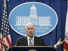 FILE - In this Jan. 10, 2018 file photo, Gov. Jerry Brown responds to a question as he discusses his proposed 2018-19 state budget at a news conference in Sacramento, Calif. Brown is preparing to release his last state budget proposal. His revised spending plan to be published Friday, May 11, 2018, will kick off a month of negotiations with the Legislature about how to spend a growing budget surplus.