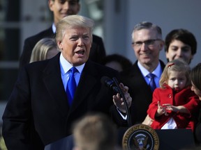 FILE - In this Jan. 19, 2018 file photo, President Donald Trump speaks to participants of the annual March for Life event, in the Rose Garden of the White House in Washington. The Trump administration will resurrect a Reagan-era rule that would ban federally-funded family planning clinics from discussing abortion with women, or sharing space with abortion providers, a senior White House official said Thursday, May 17, 2018. The Department of Health and Human Services will be announcing its proposal Friday, the official said on condition of anonymity because the official was not authorized to confirm the plans before the announcement.