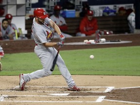 St. Louis Cardinals' Paul DeJong hits a three-run home run during the second inning of a baseball game against the San Diego Padres, Friday, May 11, 2018, in San Diego.