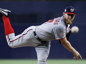 Washington Nationals starting pitcher Stephen Strasburg works against a San Diego Padres batter during the first inning of a baseball game Monday, May 7, 2018, in San Diego.