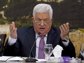 File - In this Jan. 14, 2018, file photo, Palestinian President Mahmoud Abbas speaks during a meeting with the Palestinian Central Council in the West Bank city of Ramallah. Saeb Erekat, a top aide said Monday, May 21, 2018, that Palestinian President Mahmoud Abbas is alert and making a swift recovery after being hospitalized with a fever over the weekend and should be released within days.