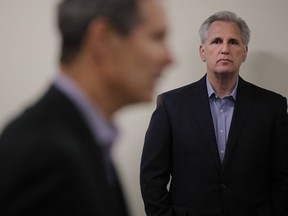 House Majority Leader Kevin McCarthy listens to his introduction before presenting students with the 23rd Congressional District of California merit awards Wednesday, May 2, 2018, in Lancaster, Calif. McCarthy, the second-ranking House Republican, is used to being underestimated. The persistent and energetic conservative from Bakersfield, a corner of California you don't see in the movies, could end up the next House speaker, third in line to the presidency.