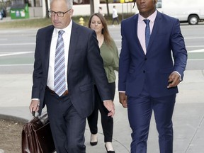 San Francisco 49ers linebacker Reuben Foster, right, arrives with his attorney Joshua Bentley at Santa Clara County Superior Court Thursday, May 17, 2018, in San Jose, Calif. Foster pleaded not guilty Tuesday, May 8, 2018, to charges stemming from allegations that he attacked his then-girlfriend in their home in February. A preliminary hearing has been scheduled today, at which point Foster's former girlfriend, Elissa Ennis, may testify under oath.