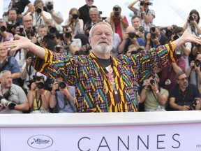 Director Terry Gilliam poses for photographers during a photo call for the film 'The Man Who Killed Don Quixote' at the 71st international film festival, Cannes, southern France, Saturday, May 19, 2018.