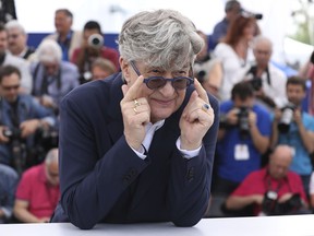 Director Wim Wenders poses for photographers during a photo call for the film 'Pope Francis: A Man of His Word' at the 71st international film festival, Cannes, southern France, Sunday, May 13, 2018.