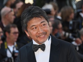 Japanese director Hirokazu Kore-Eda arrives on May 19, 2018 for the closing ceremony and the screening of the film "The Man Who Killed Don Quixote" at the 71st edition of the Cannes Film Festival in Cannes, southern France.  / AFP PHOTO / Anne-Christine POUJOULATANNE-CHRISTINE POUJOULAT/AFP/Getty Images