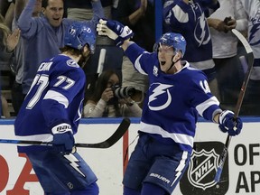 Ondrej Palat, right, celebrates with Lightning teammate Victor Hedman after scoring against the Washington Capitals during the first period of Game 5 of the Eastern Conference final on Saturday night in Tampa, Fla.