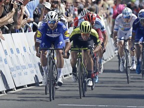 Fernando Gaviria, left, and Caleb Ewan sprint to the finish line in the fifth stage of the Amgen Tour of California cycling race, Thursday, May 17, 2018, in Elk Grove, Calif. Gaviria edged out Ewan for the win as Ewan finished second.