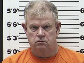 This April 29, 2018, photo provided by the Barron County Jail in Barron, Wis., shows Jeffrey Masek , a sheriff's deputy from Cottage Grove, Minn., who has been jailed in northwestern Wisconsin on felony child sex crimes. Masek, 60, is charged in Barron County with child enticement-sexual contact, attempted second-degree sexual assault of a child and using a computer to facilitate a child sex crime. (Barron County Jail via AP)