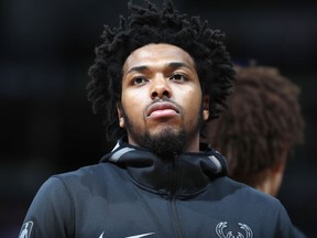 FILE - In this April 1, 2018, file photo, Milwaukee Bucks guard Sterling Brown is seen during an NBA basketball game in Denver. Milwaukee police plan to release body camera footage, Wednesday, May 23, 2018 from the officers who used a stun gun on Brown during an arrest. The release comes as city officials who've viewed the videos have expressed concern about how officers conducted themselves. Even leaders of the police department have hinted the video may make them look bad.