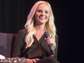 FILE - In this Aug. 29, 2017, file photo, conservative commentator Tomi Lahren attends Politicon in Pasadena, Calif. Lahren says she is disheartened and embarrassed that a patron threw water on her at a Minneapolis restaurant but says "I can handle it." The Fox News Channel contributor spoke Wednesday, May 23, 2018 on "Fox & Friends" about the weekend incident.