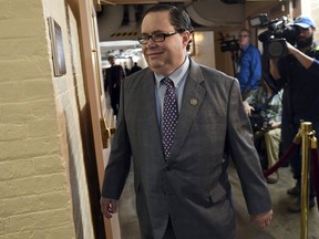 FILE - in this Dec. 19, 2017 file photo, Rep. Blake Farenthold, R-Texas, arrives on Capitol Hill in Washington. Former Rep. Farenthold has accepted a $160,000 annual salary to lobby for a Texas port, mere weeks after resigning amid fallout from a sexual harassment scandal. The Calhoun Port Authority announced Monday May 14, 2018, that Farenthold would promote its interests in Washington. He quit in April, as the House Ethics Committee investigated his using $84,000 in taxpayer funds to settle an ex-staffer's 2014 sexual harassment claim. Farenthold pledged to reimburse that, but hasn't.