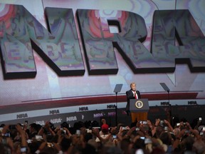 FILE - In this April 28, 2017 file photo, President Donald Trump speaks during the National Rifle Association-ILA Leadership Forum, in Atlanta. As NRA prepares to gather for its 147th annual meeting in Dallas, the political landscape has changed considerably in the past year. Even with a GOP-led Congress and a gun-friendly president in the White House, its agenda has stalled. And a new generation seems to have the upper hand in pushing for gun-control after several deadly mass shootings.