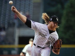 Colorado Rockies starting pitcher Jon Gray throws to a San Francisco Giants batter during the first inning of a baseball game Wednesday, May 30, 2018, in Denver.