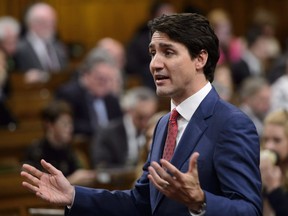 Prime Minister Justin Trudeau stands during question period in the House of Commons on Parliament Hill in Ottawa on Wednesday, May 9, 2018.