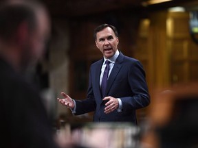 Minister of Finance Bill Morneau speaks during a Committee of the Whole in the House of Commons on Parliament Hill in Ottawa on Tuesday, May 22, 2018. Finance Minister Bill Morneau is headed west next week with plans to give a speech to a Calgary business audience a day ahead of a deadline set by Kinder Morgan for its controversial Trans Mountain pipeline expansion project.