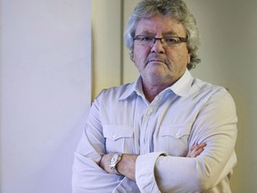 Producer Kevin Tierney poses for a photo in Montreal, Tuesday, Feb. 9, 2010. The Montreal producer behind the hit bilingual film "Bon Cop, Bad Cop" has died at the age of 67. Kevin Tierney's son announced his father's death on social media.