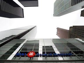 A Bank of Montreal sign is shown in the financial district in Toronto on Tuesday, August 22, 2017. BMO is warning that "fraudsters" from outside of the country may have accessed certain personal and financial information of some of its customers. The bank says that fraudsters contacted BMO on Sunday claiming to be in possession of certain data for a "limited number of customers" and it believes the attack was originated outside of Canada.THE CANADIAN PRESS/Nathan Denette