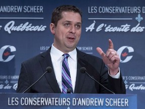 Conservative Leader Andrew Scheer responds to a question during a news conference in Montreal on April 19, 2018. Conservative Leader Andrew Scheer's proposed tax credit for parents would cost the federal government over $600 million dollars in lost revenues in the first year - and this number could go even higher, according to a new report by the federal budget watchdog. The parliamentary budget office released a report this morning saying Bill C-394, which would bring in a tax credit for those on parental leave, would result in foregone revenues of $607.6 million in 2018-19.