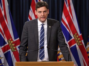 Attorney General David Eby speaks during a press conference in the press theatre at Legislature in Victoria, B.C., on Thursday April 26, 2018.