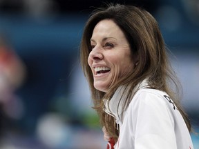 Canadian curler Cheryl Bernard smiles during a training session for the women's curling matches at the 2018 Winter Olympics in Gangneung, South Korea, Monday, Feb. 12, 2018. Olympic curler Bernard has been named the new president and chief executive officer of Canada's Sports Hall of Fame.