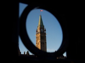 Parliament Hill in Ottawa is shown on October 29, 2013. A newly-launched federal housing fund is looking for early wins in a bid to help women fleeing domestic violence and people with developmental disabilities.
