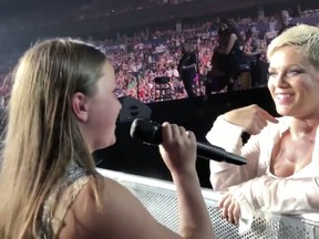 Victoria Anthony sings to musician Pink in this still image taken from a video on Anthony's Twitter page.