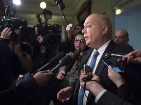 Quebec government MNA Robert Poeti responds to reporters questions over a rumour over candidates in his riding for the next provincial election, Tuesday, May 2, 2017 at the legislature in Quebec City.