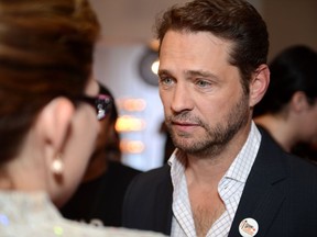 Jason Priestley attends Stand Up To Cancer Canada on Friday, Sept. 5, 2014, in Toronto. Priestley says it's merely a coincidence that the upcoming return of "Private Eyes" is reminiscent of recent headlines surrounding the Canadian actor.