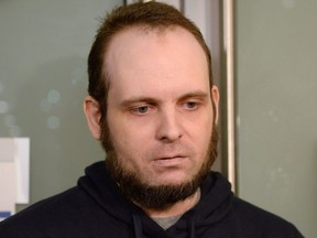 Joshua Boyle speaks to members of the media at Toronto's Pearson International Airport on Friday, October 13, 2017. A bail hearing is underway for former Afghanistan hostage Boyle, who faces several assault charges.