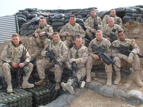 Lionel Desmond (front row, far right) was part of the 2nd battalion, of the Royal Canadian Regiment, based at CFB Gagetown and shown in this 2007 handout photo taken in Panjwai district in between patrol base Wilson and Masum Ghar in Afghanistan. Nova Scotia's justice minister says the terms of reference for the public inquiry into the deaths of Afghan war veteran Desmond and his family could be released within a couple of weeks.