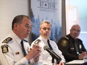 Quebec City police chief Robert Pigeon speaks at a news conference of the joint forces for the G7 Summit, Wednesday, May 16, 2018 in Quebec City. From left, Robert Pigeon, RCMP inspector Christian Cote and Surete du Quebec Lt. Jason Allard, look on. Quebec City Mayor Regis Labeaume says he believes federal dollars will be available for any citizens who suffer property damage during next week's G7 summit.