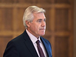 Newfoundland and Labrador Premier Dwight Ball leaves a Council of the Federation meeting in Ottawa on Tuesday, Oct. 3, 2017. Newfoundland and Labrador will bring down its latest budget today. Harassment allegations gripped Newfoundland and Labrador's governing Liberals again Tuesday after former finance minister Cathy Bennett said a culture of intimidation helped drive her from cabinet.