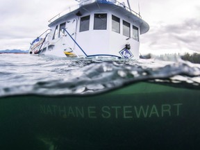 The tugboat Nathan E. Stewart is seen in the waters of the Seaforth Channel near Bella Bella, B.C., in an October 23, 2016, handout photo. Results are expected today from an investigation into what caused a tugboat to crash and sink off British Columbia's coast in 2016, spilling thousands of litres of fuel into the ocean.