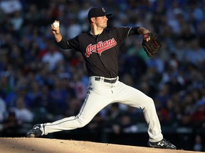 Cleveland Indians' Adam Plutko pitches during the first inning of the team's baseball game against the Chicago Cubs on Wednesday, May 23, 2018, in Chicago.