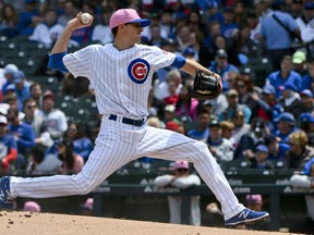 Chicago Cubs starting pitcher Kyle Hendricks (28) delivers during the first inning of a baseball game against the Chicago White Sox on Sunday, May 13, 2018, in Chicago.