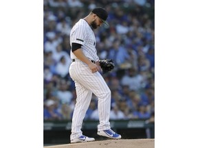 Chicago Cubs starting pitcher Tyler Chatwood kicks the mound during the first inning of a baseball game against the San Francisco Giants in Chicago, Sunday, May 27, 2018.