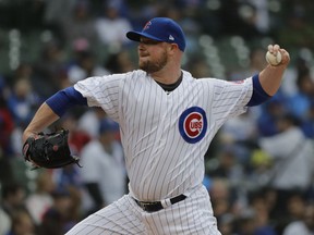 Chicago Cubs starting pitcher Jon Lester throws against the Chicago White Sox during the first inning of a baseball game Saturday, May 12, 2018, in Chicago.