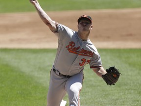 Baltimore Orioles starting pitcher Dylan Bundy delivers during the first inning of a baseball game against the Chicago White Sox Thursday, May 24, 2018, in Chicago.