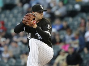 Chicago White Sox starting pitcher Dylan Covey winds up during the first inning of a baseball game against the Baltimore Orioles Wednesday, May 23, 2018, in Chicago.